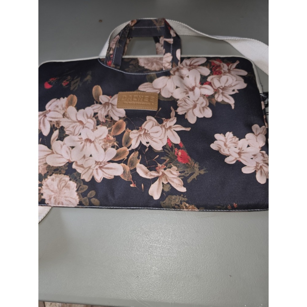 dachee laptop bag. Measures 16"by 11". Outside Pocket Holds Your Supplies . - Picture 3 of 3